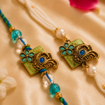 Teal Meenakari Peacock Rakhi Set with Pearl Tassel for Brother