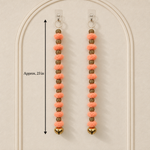 Peach Pom-Pom Bell Hanging - detail view