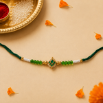 Emerald Teardrop Kundan Rakhi with Pearl Accents for Brother - view 2