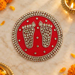 Red round mirror border Charan Padika overhead view