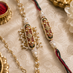 Maroon Meenakari floral bar Rakhi and pearl chain bracelet set - close-up