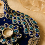 Angled view of the Round Peacock Décor Set