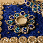 Close-up of the centre tealight and mirror work